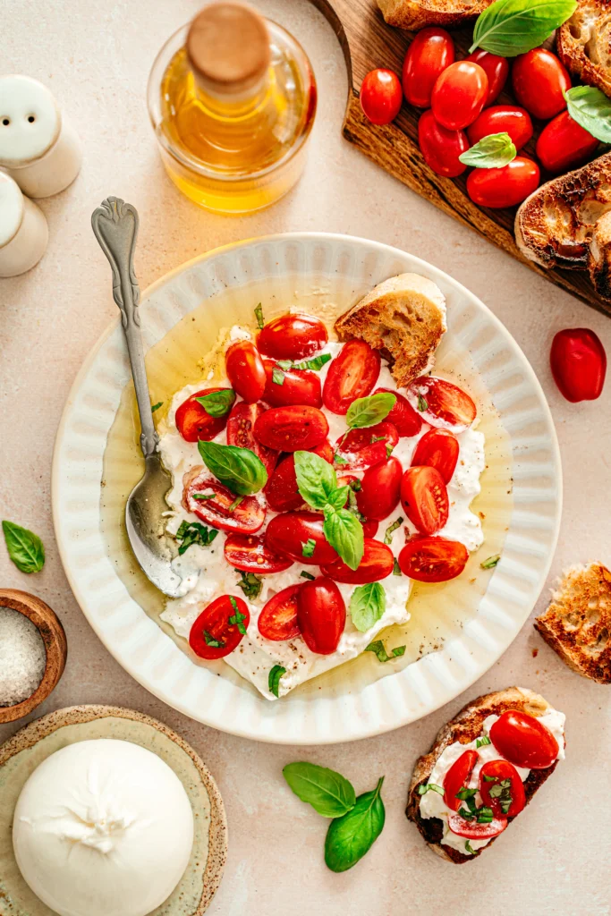 Burrata deliziosa tomates cerises huiles d'olives - Alexandra Hanger Photographie - Mise en scène et recette